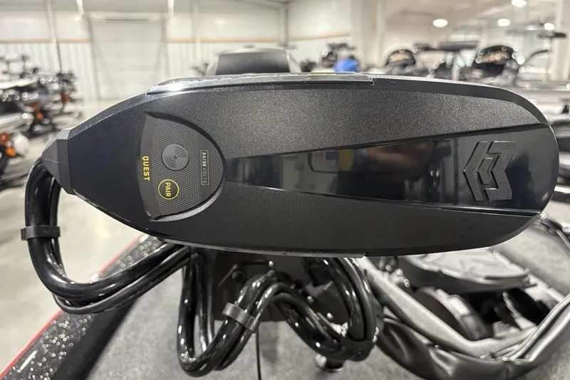 Slide: The Image of Close-up of 2026 Skeeter ZXE20 boat component with Quest and Pair buttons. - 9