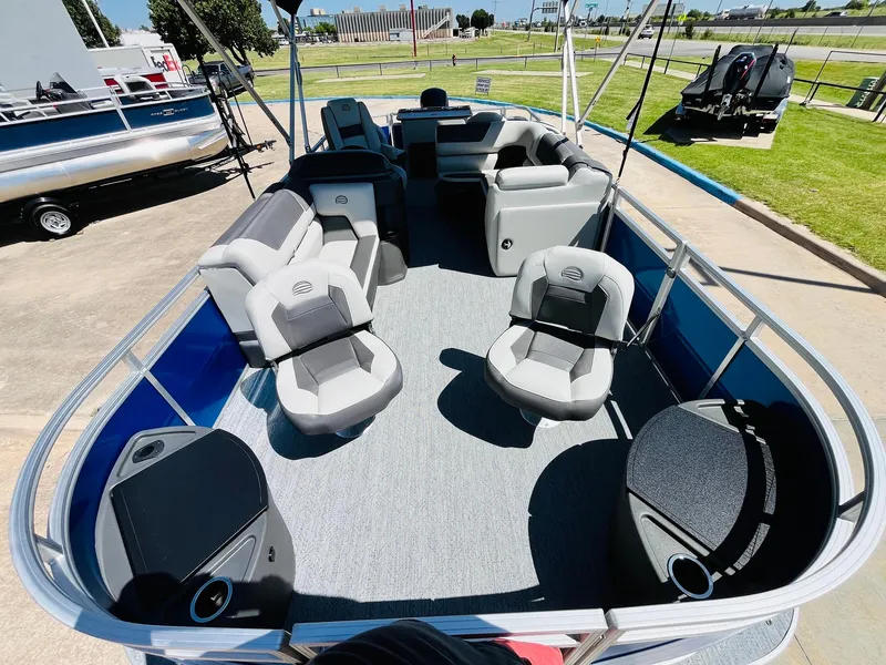 Slide: The Image of 2026 Sun Tracker Fishin' Barge 20 DLX pontoon boat with spacious seating and modern design. - 10