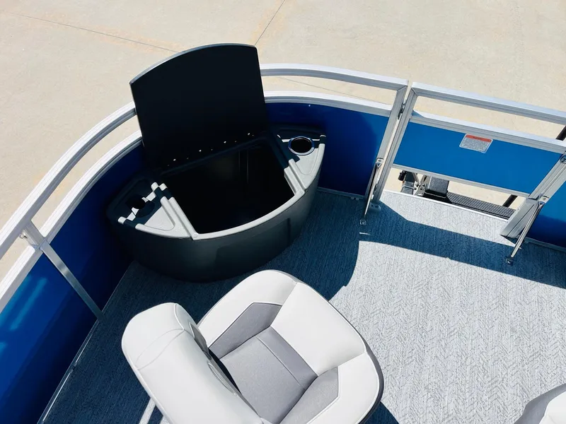 Slide: The Image of 2026 Sun Tracker Fishin' Barge 20 DLX interior with seating and storage. - 14