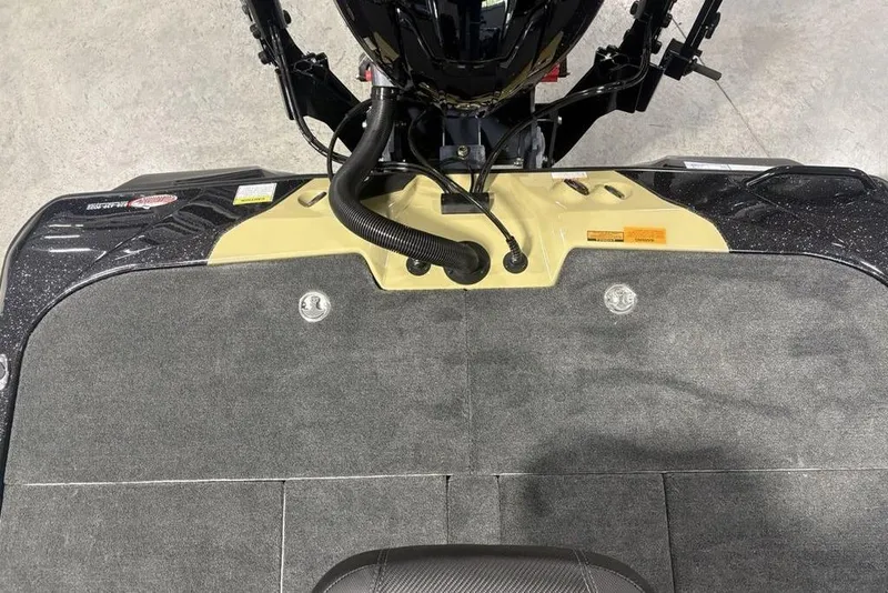 Slide: The Image of 2026 Skeeter ZXE20 boat deck with motor and carpeted surface. - 28