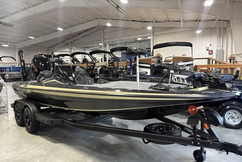 Slide: The Image of 2026 Skeeter ZXE20 boat displayed in a showroom, featuring sleek design and modern equipment. - 4