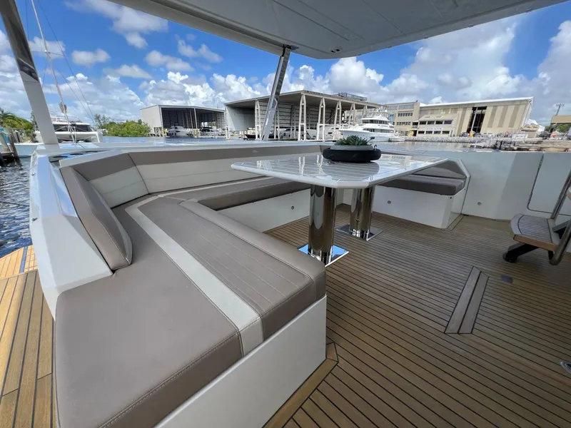 Slide: The Image of Luxurious 2020 Galeon 680 Fly yacht with spacious sunbathing deck, docked at marina. - 13