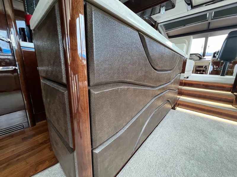 Slide: The Image of Luxurious interior of 2020 Galeon 680 Fly yacht with modern kitchen and seating area. - 32