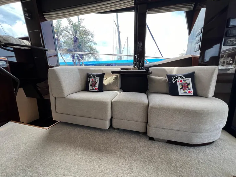 Slide: The Image of Luxurious interior of 2020 Galeon 680 Fly yacht with plush seating and scenic window views. - 35