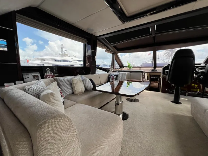 Slide: The Image of Luxurious interior of 2020 Galeon 680 Fly yacht with plush seating and decorative pillows. - 37