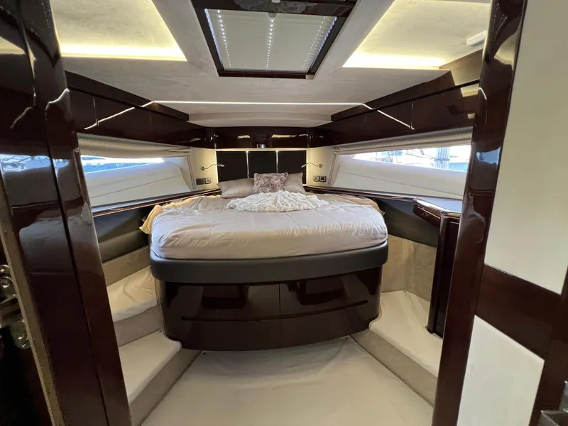 Slide: The Image of Luxurious bedroom interior of 2020 Galeon 680 Fly yacht with elegant wood finishes. - 48