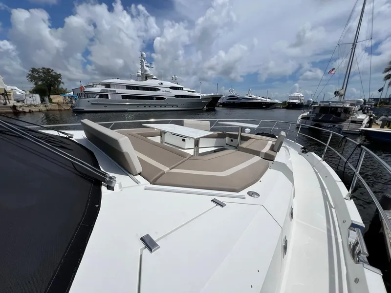 Slide: The Image of Galeon 680 Fly yacht, 2020 model, docked with sleek design and reflective surfaces. - 8