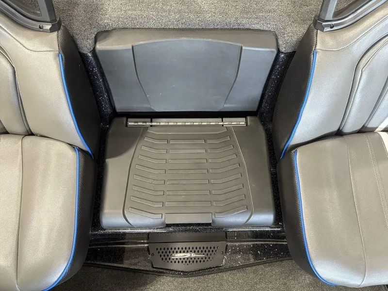 Slide: The Image of 2026 Skeeter ZXE20 interior seating with gray upholstery and blue accents. - 18