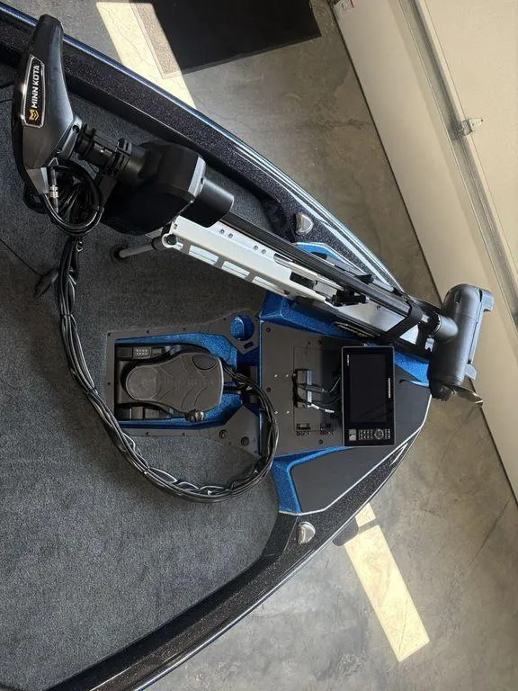 Slide: The Image of 2026 Skeeter ZXE20 boat with advanced trolling motor and navigation system. - 8