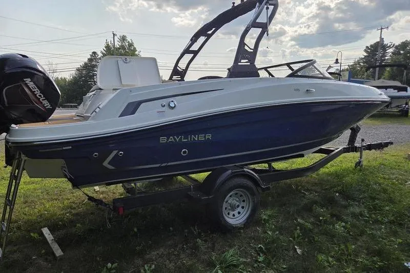Slide: The Image of 2025 Bayliner VR5 OB boat on trailer, side view, outdoors. - 8
