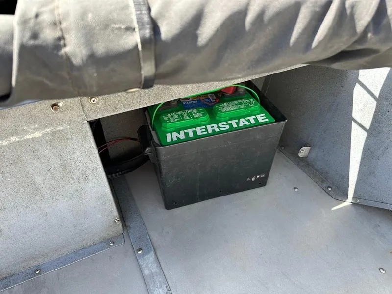 Slide: The Image of Interstate battery in a 2001 Smoker Craft 160 SP boat compartment. - 20