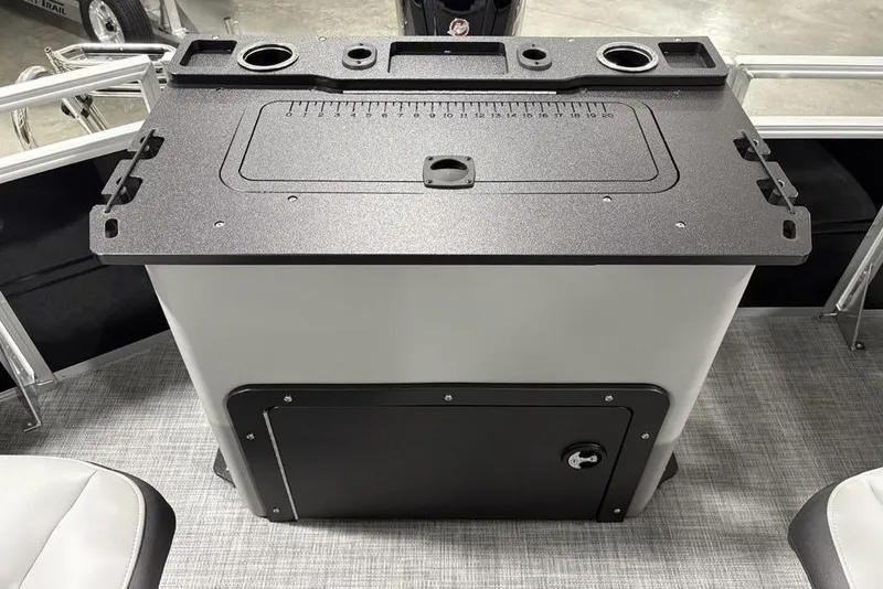 Slide: The Image of 2026 Sun Tracker SportFish™ 22 DLX fishing station with integrated measuring board and storage. - 10