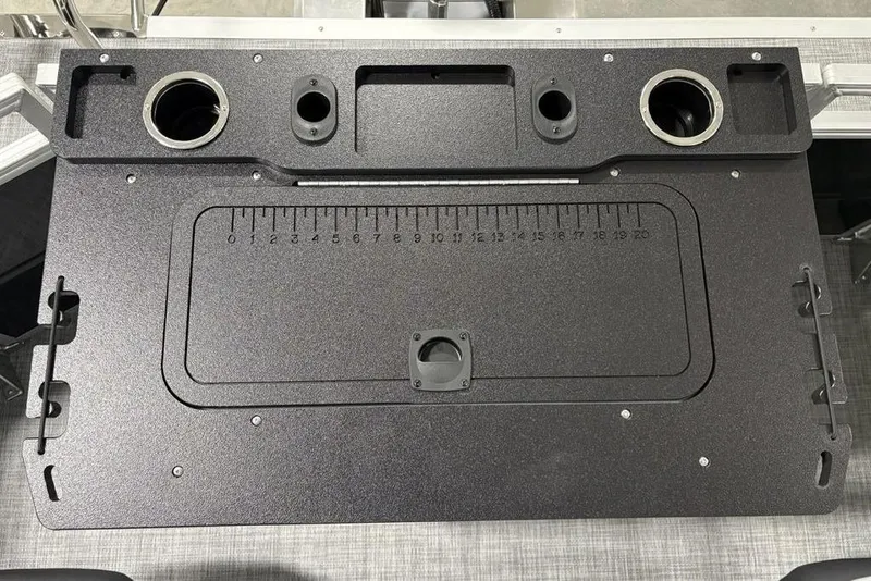 Slide: The Image of 2026 Sun Tracker SportFish™ 22 DLX fishing station with integrated ruler and cup holders. - 15