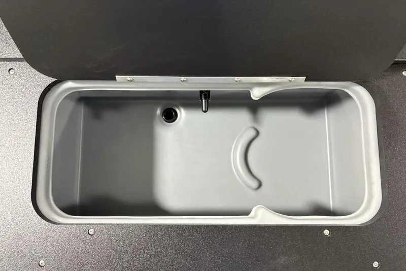 Slide: The Image of 2026 Sun Tracker SportFish™ 22 DLX livewell, gray interior, open lid view. - 20