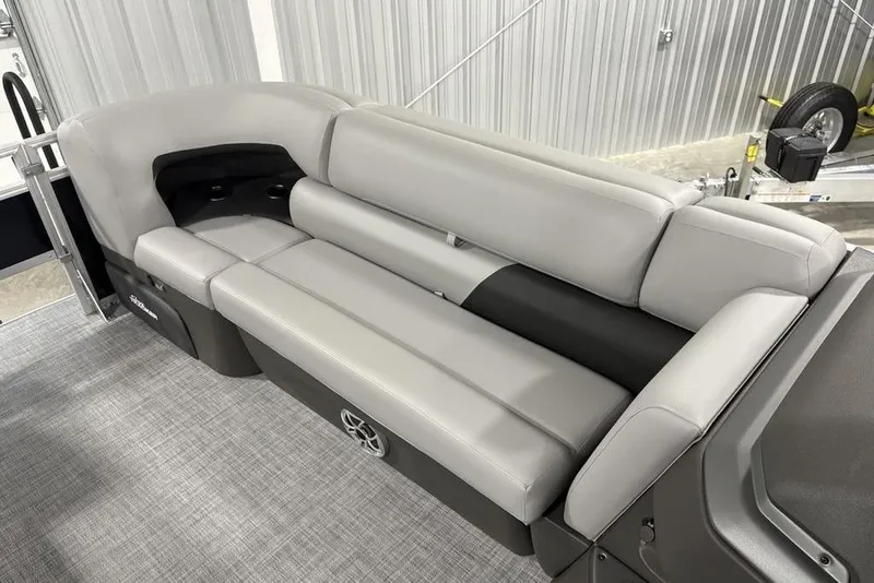 Slide: The Image of 2026 Sun Tracker SportFish™ 22 DLX boat interior with gray cushioned seating. - 29