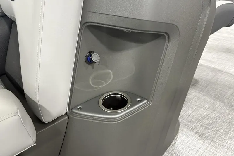 Slide: The Image of 2026 Sun Tracker SportFish™ 22 DLX boat interior with cup holder and USB port. - 39