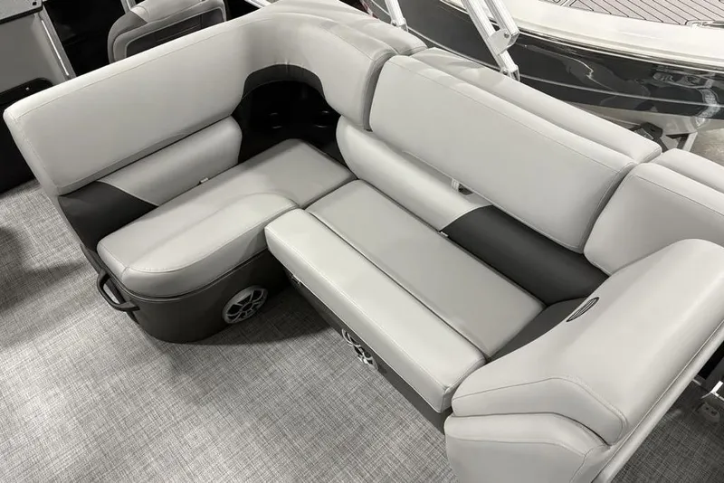 Slide: The Image of 2026 Sun Tracker SportFish™ 22 DLX boat seating, featuring sleek gray and black upholstery. - 6