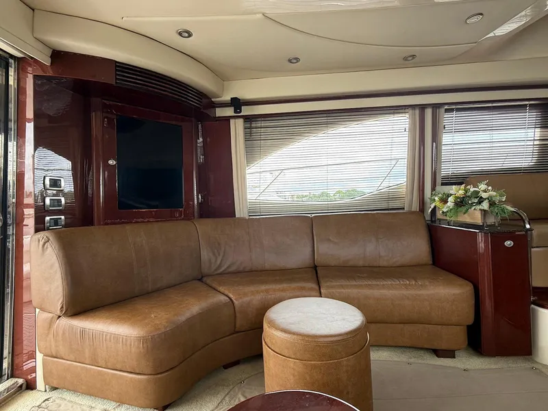Slide: The Image of Luxurious interior of 2007 Sea Ray 52 Sedan Bridge with leather seating and elegant decor. - 26