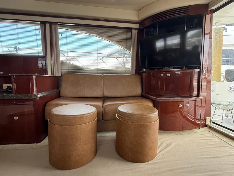 Slide: The Image of Luxurious 2007 Sea Ray 52 Sedan Bridge interior with leather seating and modern entertainment system. - 27