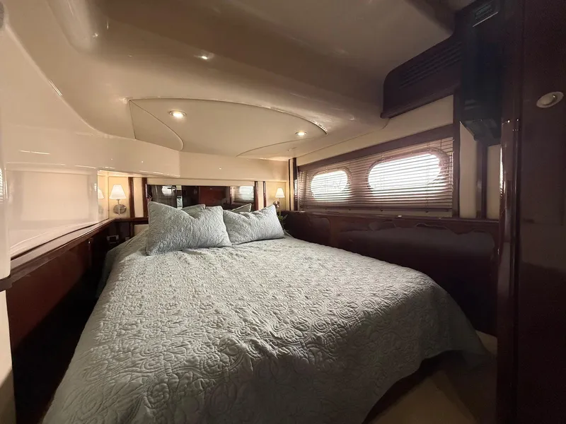 Slide: The Image of Luxurious bedroom interior of 2007 Sea Ray 52 Sedan Bridge yacht. - 35