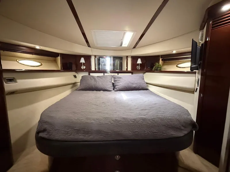Slide: The Image of Luxurious bedroom interior of 2007 Sea Ray 52 Sedan Bridge yacht. - 43