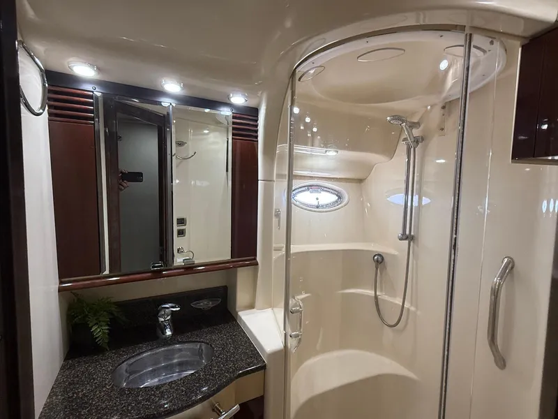 Slide: The Image of Luxurious bathroom in 2007 Sea Ray 52 Sedan Bridge yacht with shower and vanity. - 47