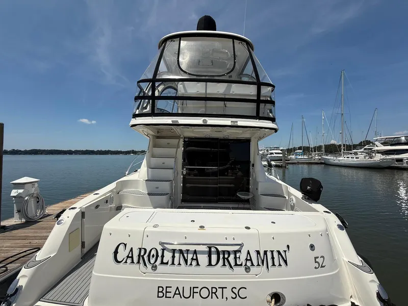Slide: The Image of 2007 Sea Ray 52 Sedan Bridge yacht docked in Beaufort, SC under clear blue skies. - 9