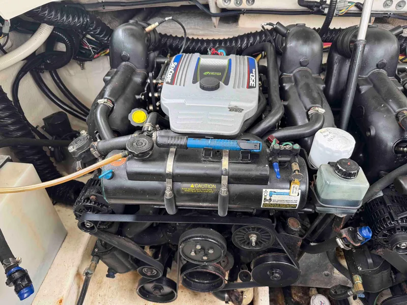 Slide: The Image of Engine of a 2013 Monterey 328 Super Sport boat, showcasing detailed components. - 47