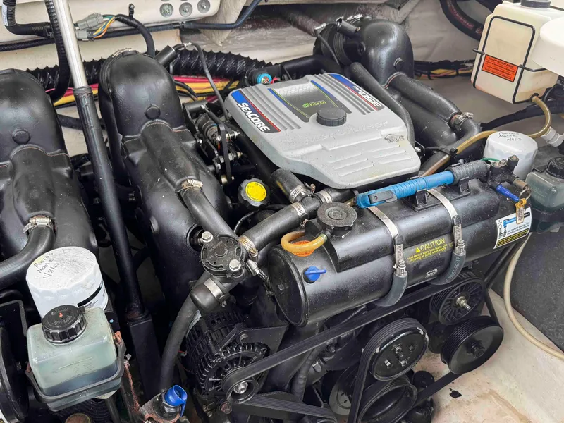 Slide: The Image of Engine of a 2013 Monterey 328 Super Sport boat, showcasing detailed components. - 48