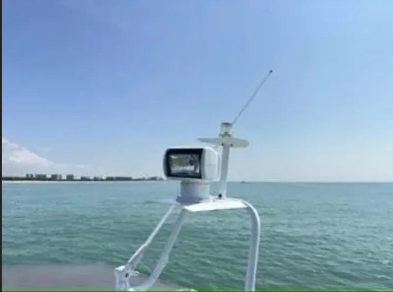 Slide: The Image of 2020 Axopar 28 TT boat on calm sea with clear blue sky. - 4