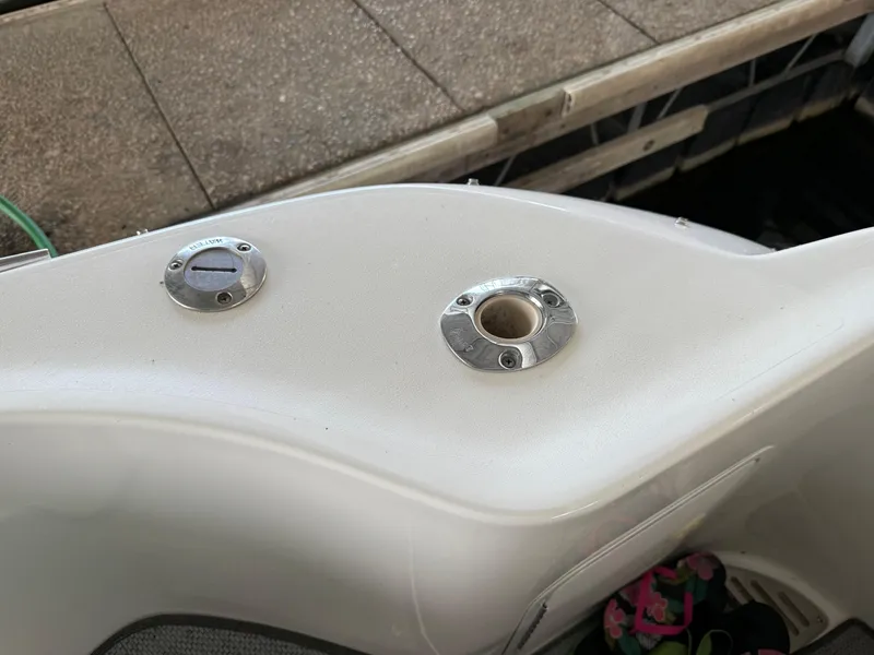 Slide: The Image of 1999 Sea Ray 400 Sedan Bridge deck fittings and water inlet. - 11