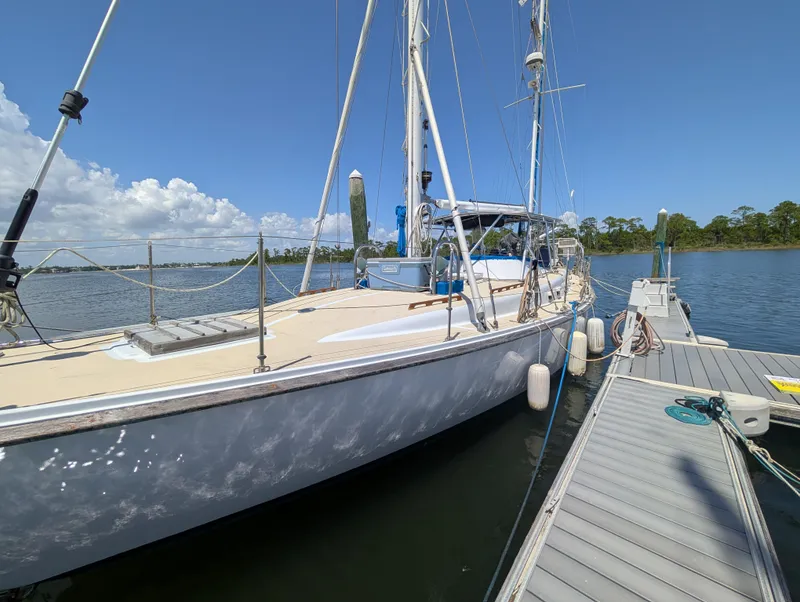 Slide: The Image of Sailboat Mason COHORT II 1976 docked on a sunny day with clear skies. - 20