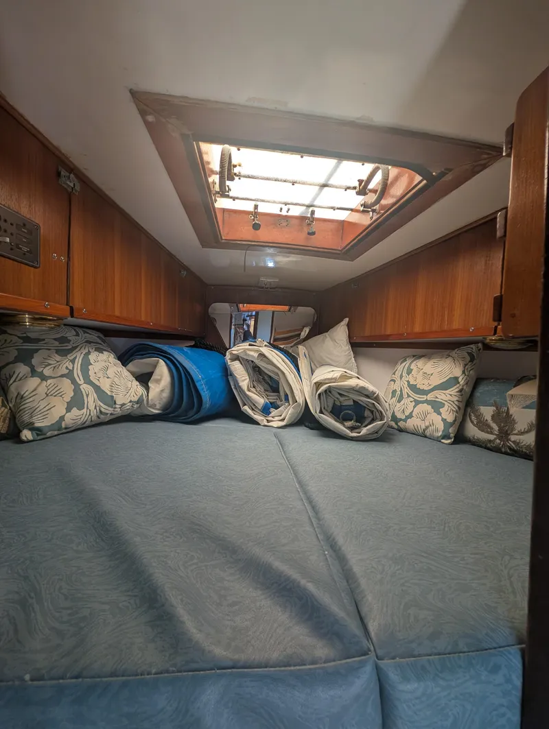 Slide: The Image of Cozy cabin interior of 1976 Mason COHORT II with skylight and cushions. - 8