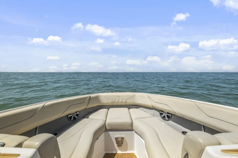 Slide: The Image of 2019 Regal LS4 boat interior with ocean view under blue sky. - 7