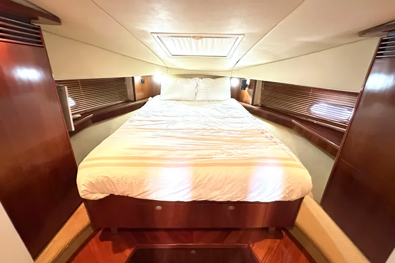 Slide: The Image of Luxurious cabin interior of 2005 Sea Ray 48 Sundancer yacht with cozy bed. - 20