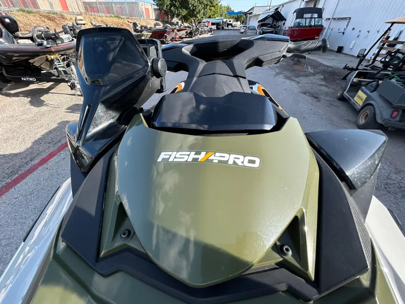 Slide: The Image of 2020 Sea-Doo FISH PRO 170 jet ski, olive green, parked outdoors. - 11