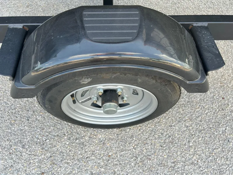 Slide: The Image of Trailer wheel and fender for 2020 Sea-Doo FISH PRO 170 on asphalt surface. - 15