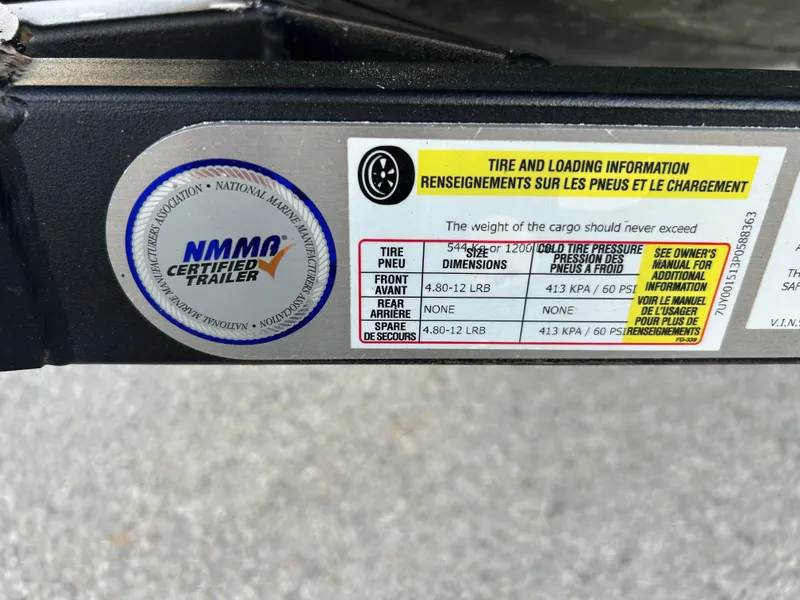 Slide: The Image of NMMA certified trailer label with tire and loading information for Sea-Doo FISH PRO 170. - 20