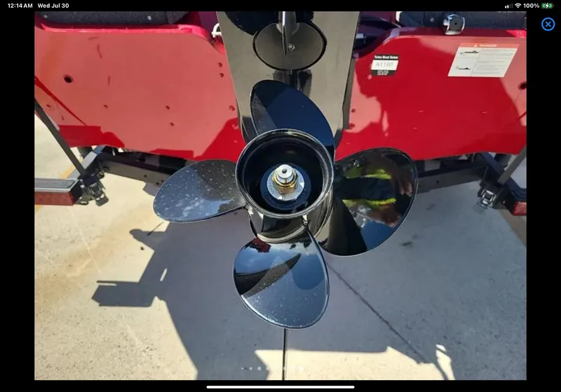 Slide: The Image of 2024 Lund 1675 Adventure Sport boat propeller, close-up view, on a sunny day. - 10
