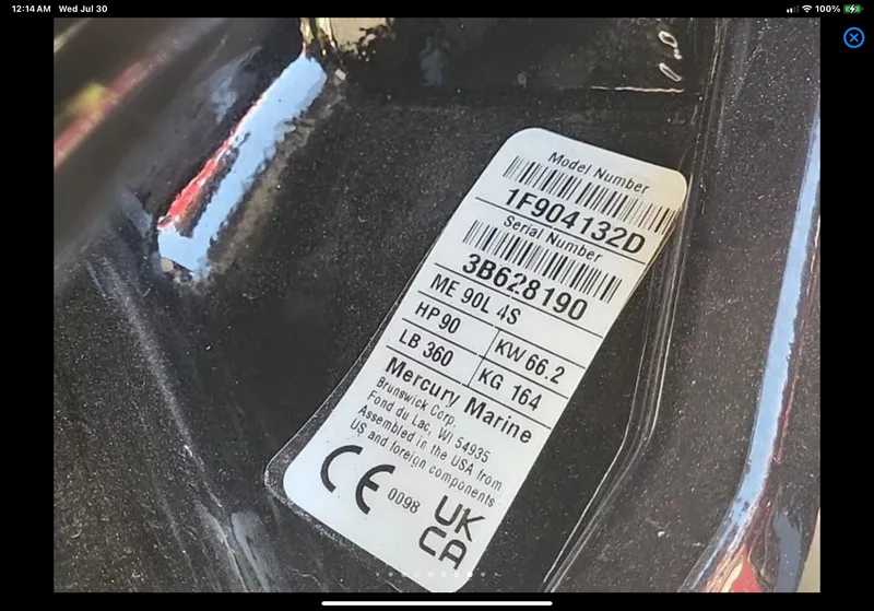 Slide: The Image of Label on a 2024 Lund 1675 Adventure Sport, featuring Mercury Marine engine details. - 12