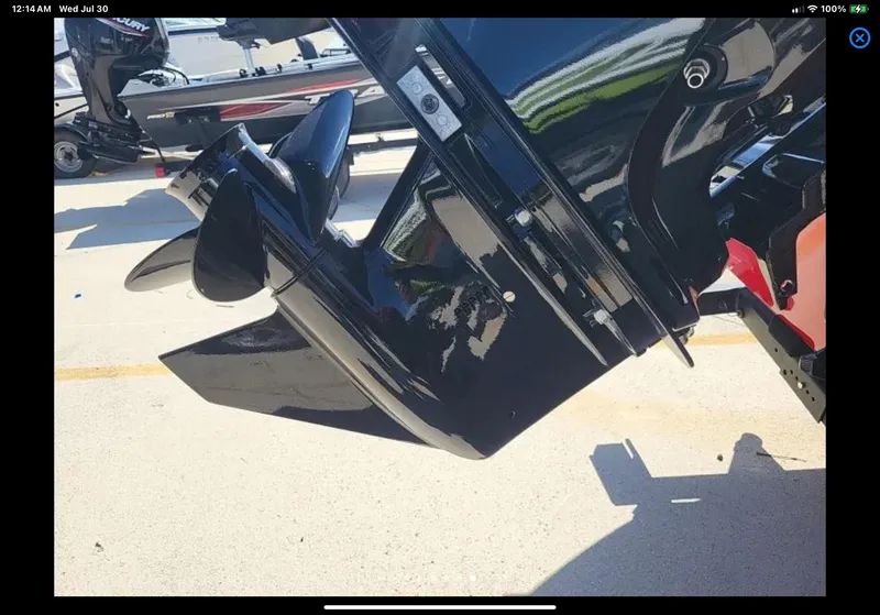 Slide: The Image of 2024 Lund 1675 Adventure Sport boat motor close-up, showcasing sleek black design. - 14