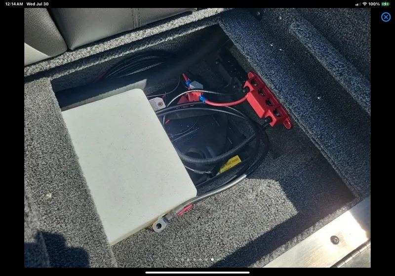 Slide: The Image of 2024 Lund 1675 Adventure Sport boat interior wiring compartment. - 18