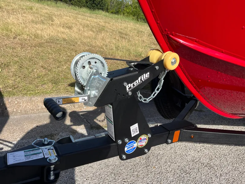 Slide: The Image of Trailer winch of 2024 Lund 1675 Adventure Sport boat, parked on a sunny day. - 25