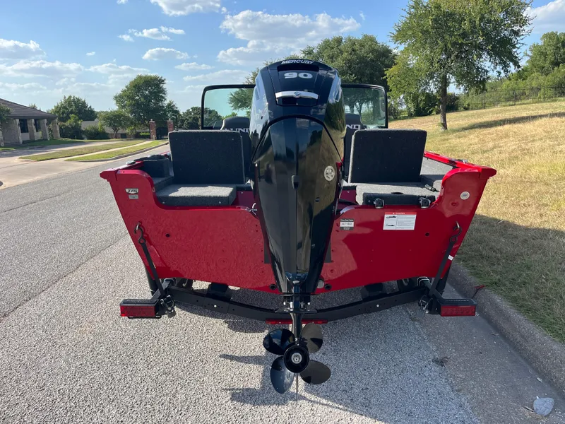 Slide: The Image of 2024 Lund 1675 Adventure Sport boat with Mercury engine on a sunny street. - 35