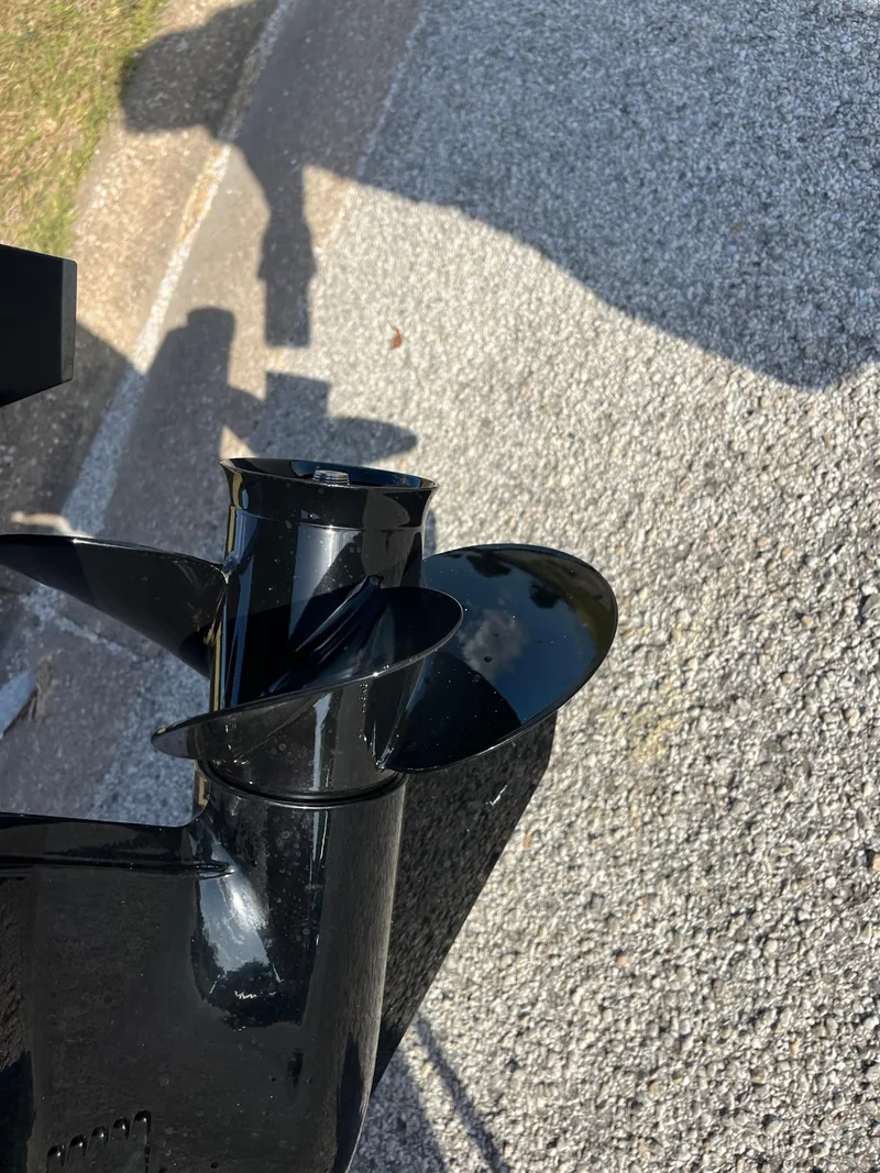 Slide: The Image of 2024 Lund 1675 Adventure Sport boat propeller on pavement. - 38