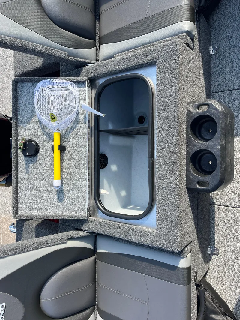 Slide: The Image of 2024 Lund 1675 Adventure Sport boat interior with livewell, net, and cup holders. - 45