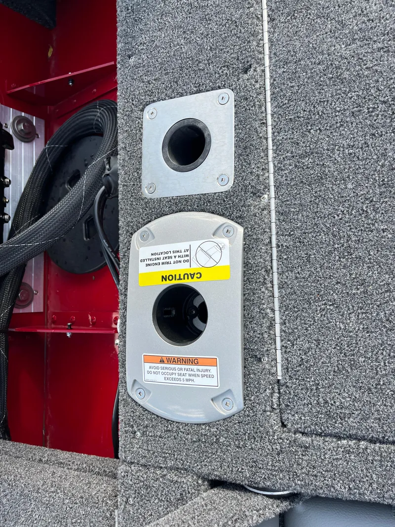 Slide: The Image of 2024 Lund 1675 Adventure Sport boat interior with caution labels and wiring details. - 47