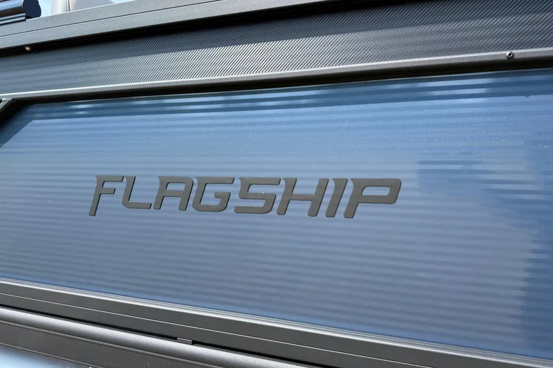 Slide: The Image of Flagship E22RF Sport Toon 2025 logo on sleek metallic surface. - 25
