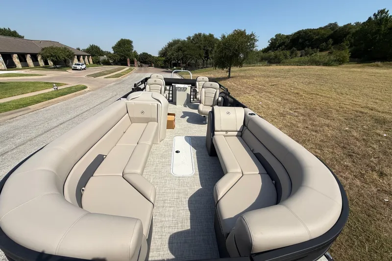 Slide: The Image of 2025 Flagship E22RF Sport Toon pontoon boat with spacious seating and modern design. - 40