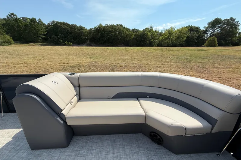 Slide: The Image of Luxurious seating on 2025 Flagship E22RF Sport Toon boat, with scenic outdoor backdrop. - 43
